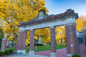 College green and alumni gateway at Ohio University on a fall day